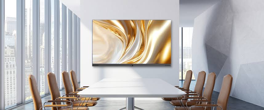 images-2 Meeting room with a large wall display, a white table and wooden chairs